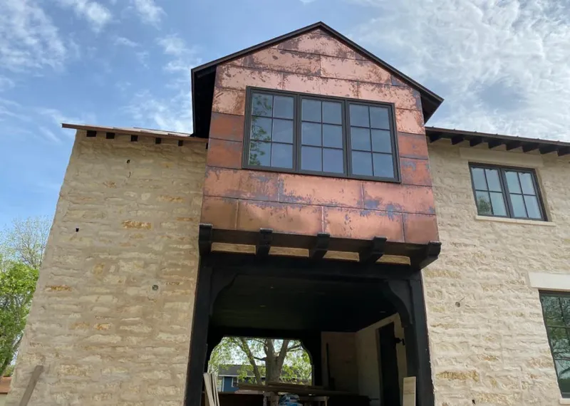 Copper metal panel facade on a stone building for Skylight Installation in Tiburon