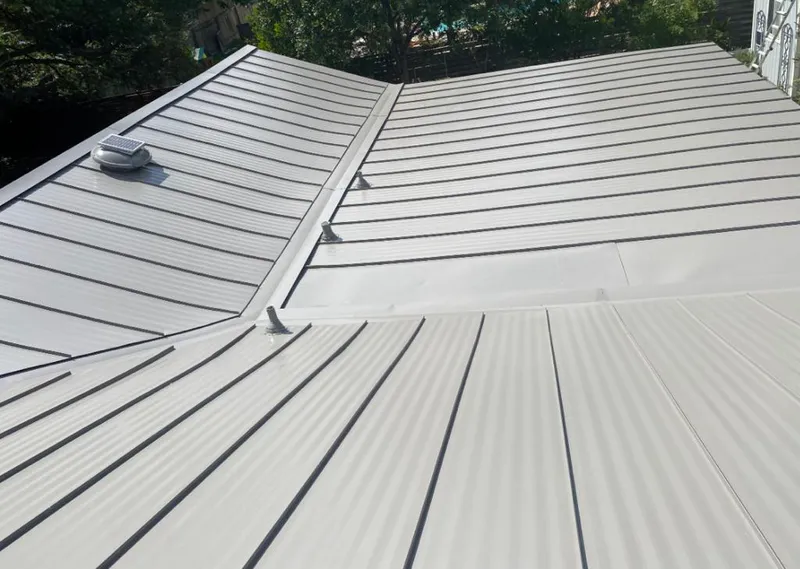 Solar attic fan installed on a metal roof for Roof Ventilation in Tiburon